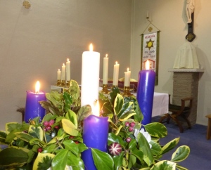 The lit Christmas candle