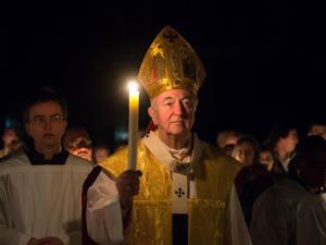 Cardinal-Vincent-Nichols-walks-prayerfully-with-a-lit-candle_medium